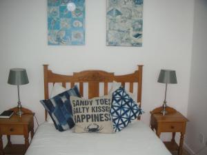 Ένα ή περισσότερα κρεβάτια σε δωμάτιο στο Waterside Living NT01