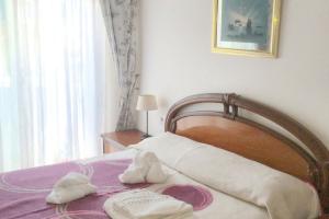 Postel nebo postele na pokoji v ubytování Charming Apartment in El Grove, Sea View