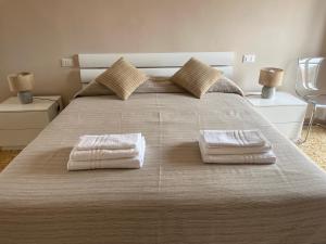 Postel nebo postele na pokoji v ubytování Casa Mirfak