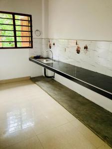 Stolní tenis v ubytování Ameena Homestay nebo okolí