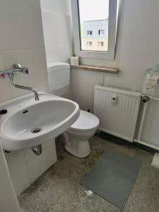 Ένα μπάνιο στο 5 Betten Monteurwohnung in Zeithain