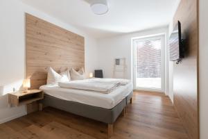 Postel nebo postele na pokoji v ubytování Arton Lachtal - Apartments Steiermark