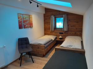 Ένα ή περισσότερα κρεβάτια σε δωμάτιο στο Rainerhof Apartment 4