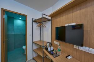 TV a/nebo společenská místnost v ubytování Sapphire Club Hub