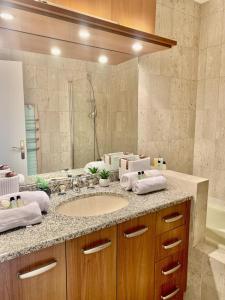 a bathroom with a sink and a large mirror at Gray d'Albion POL519 studio in Cannes +12 photos