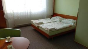 Postel nebo postele na pokoji v ubytování Ubytování - Žáková