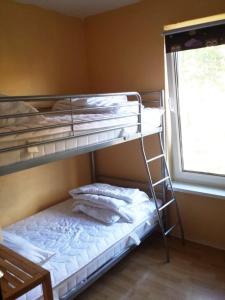 Ένα ή περισσότερα κρεβάτια σε δωμάτιο στο Bungalow Mechow