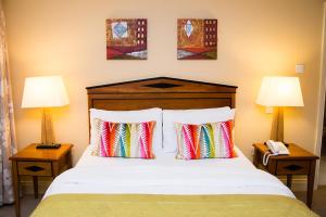 מיטה או מיטות בחדר ב-Davitts Guesthouse
