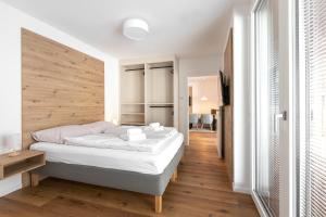 Postel nebo postele na pokoji v ubytování Arton Lachtal - Apartments Steiermark + 98 fotografií