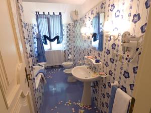 Een badkamer bij Affittacamere Villa Gigli