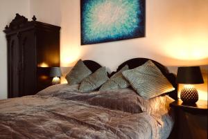 Postel nebo postele na pokoji v ubytování Kisbattyán Vendégház