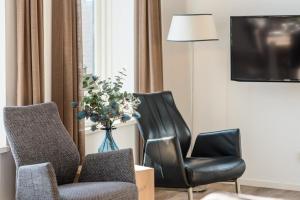 TV a/nebo společenská místnost v ubytování Staetige Dames