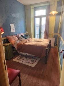 Lova arba lovos apgyvendinimo įstaigoje Gîte Groupe La Farigoule à Siguer