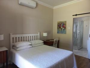 Postel nebo postele na pokoji v ubytování Rietjiesbos Self Catering