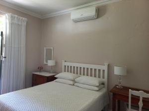 Postel nebo postele na pokoji v ubytování Rietjiesbos Self Catering