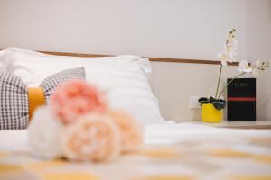 Postel nebo postele na pokoji v ubytování Margaery Apartment Tu Hoa Princess