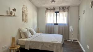 Postel nebo postele na pokoji v ubytování Eden Paradise, Anse à la Barque