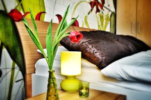 Postel nebo postele na pokoji v ubytování Design Hotel Romantick
