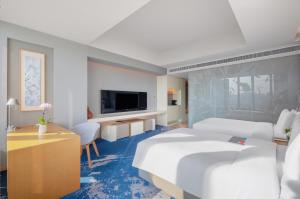 TV a/nebo společenská místnost v ubytování Le Meridien Hangzhou, Binjiang