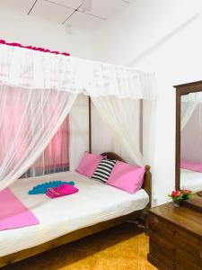 Letto o letti in una camera di Moon Glow Guest