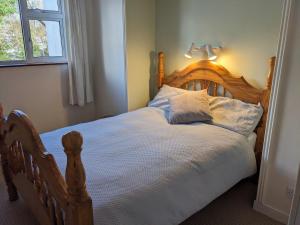 Krevet ili kreveti u jedinici u objektu Dunloe View