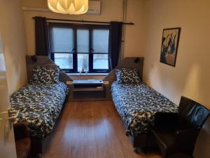 Postel nebo postele na pokoji v ubytování B&B Harskamp