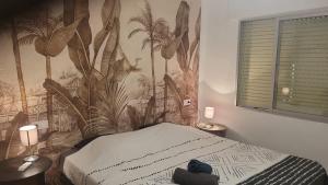Posteľ alebo postele v izbe v ubytovaní Appartement à 250m de la plage