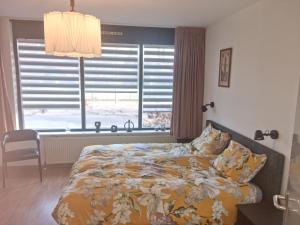 Postel nebo postele na pokoji v ubytování B&B Harskamp