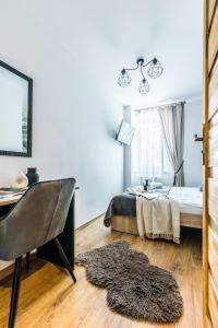 Posteľ alebo postele v izbe v ubytovaní Apartament Piaseckiego Centrum