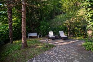 Κήπος έξω από το Casa Claudia, a due passi da lago e spiaggia