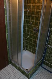 Ένα μπάνιο στο Ferienwohnung Mellum