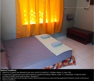 Ένα ή περισσότερα κρεβάτια σε δωμάτιο στο Resort Iman D'Semungkis