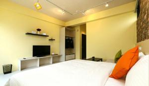 TV a/nebo společenská místnost v ubytování Happiness 210 B&B