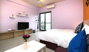 TV a/nebo společenská místnost v ubytování Happiness 210 B&B