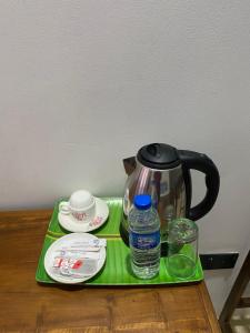 Příslušenství pro přípravu čaje a kávy v ubytování Hotel Hanguk Villa