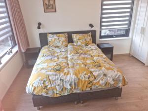 Postel nebo postele na pokoji v ubytování B&B Harskamp