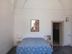 A bed or beds in a room at Casetta Rita