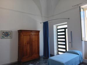 A bed or beds in a room at Casetta Rita