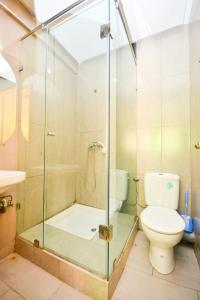 Koupelna v ubytování Cozy Central - Gym & Spa Srvcs