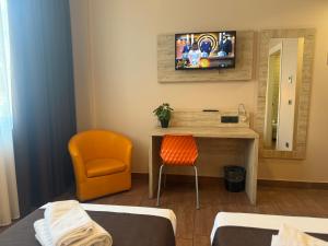 TV a/nebo společenská místnost v ubytování Hotel Giacosa