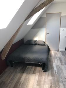 Ένα ή περισσότερα κρεβάτια σε δωμάτιο στο Quiet studio