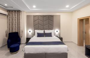 Postel nebo postele na pokoji v ubytování STP Apartments