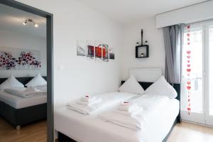 A bed or beds in a room at Apartment Panoramablick