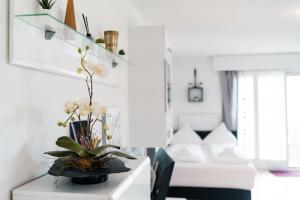A bed or beds in a room at Apartment Panoramablick
