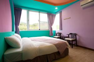 Rúm í herbergi á South View B&B