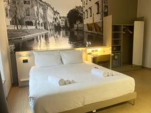 Postel nebo postele na pokoji v ubytování B&B Hotel Treviso