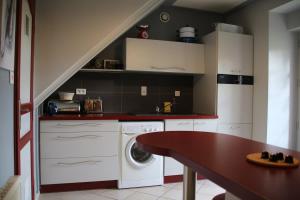 Kuchyň nebo kuchyňský kout v ubytování An Ty Lubin