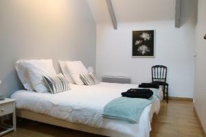 Postel nebo postele na pokoji v ubytování An Ty Lubin