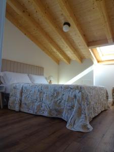 Postel nebo postele na pokoji v ubytování Apartamentos rurales la tienda de Villanueva Mar y montaña