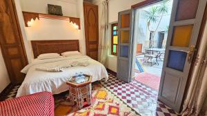 Postel nebo postele na pokoji v ubytování Riad Matins De Marrakech + 37 fotografií